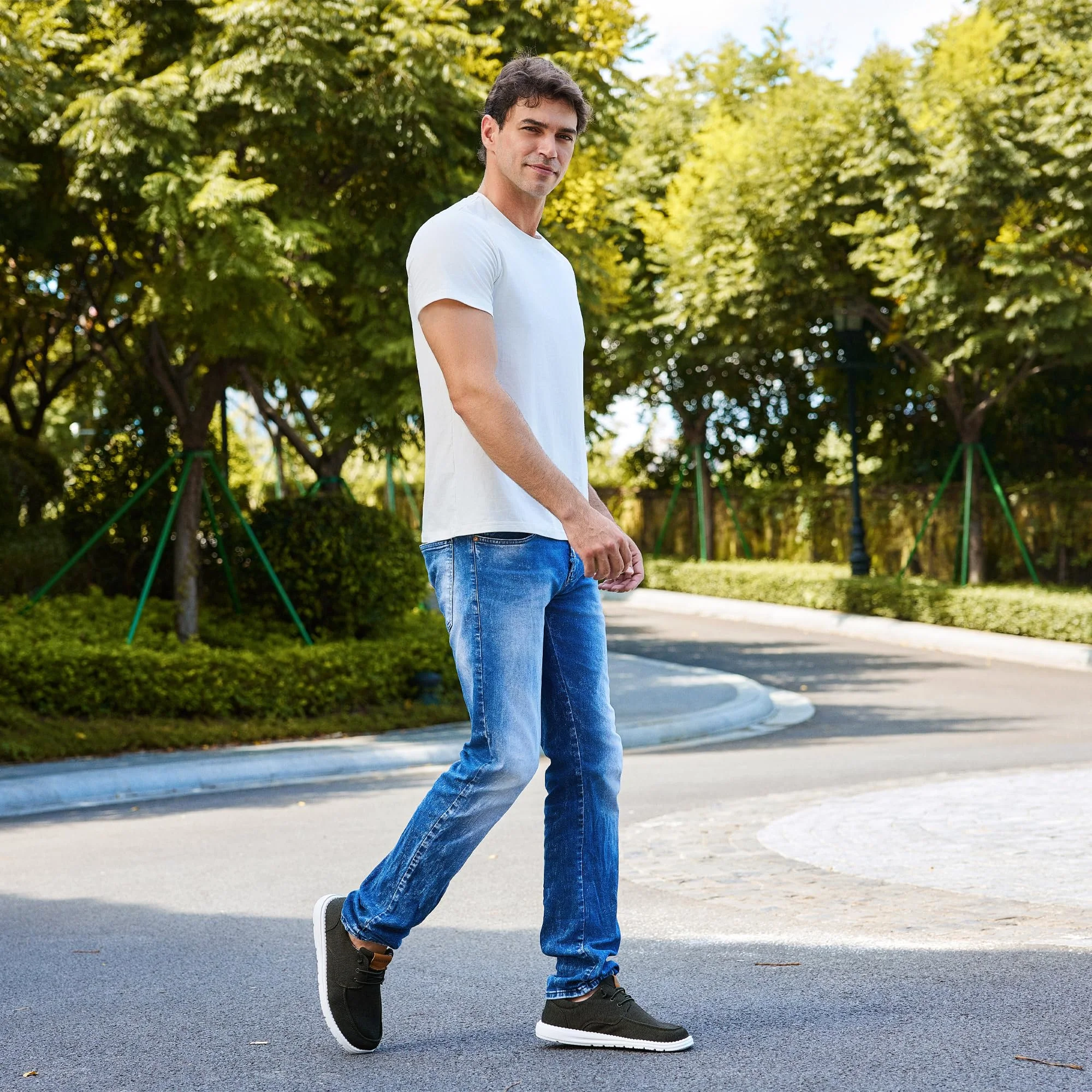A man walking in ASITVO canvas boat loafers